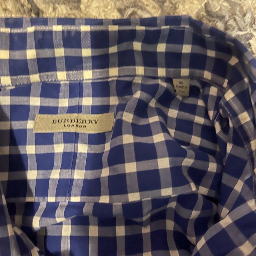 Multiple items… diesel pants and Burberry shirt